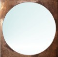 Lustro okrągłe, w kwadratowej miedzianej ramie.